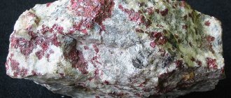 Cinnabar. Crystals in rock 