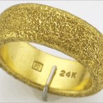 This is how yellow metal jewelry is marked abroad.